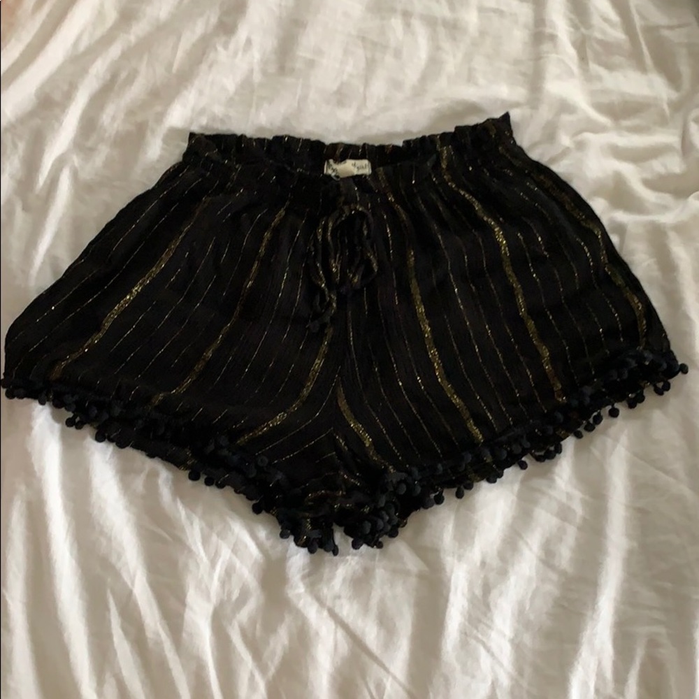 Black and gold flowy shorts
